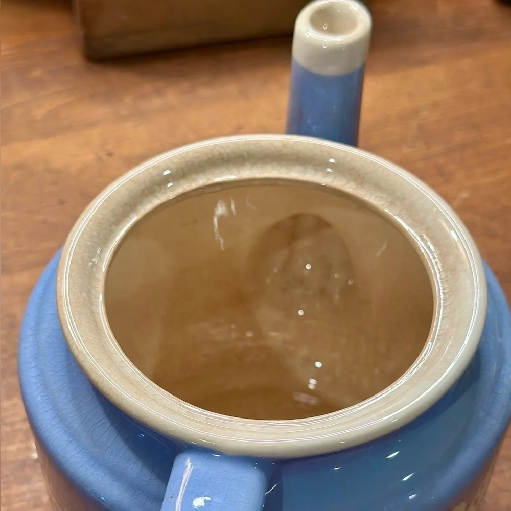 Vintage Blue Ceramic Teapot with Floral Design and Lid